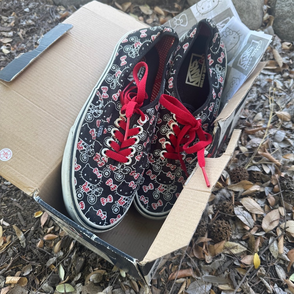 Vans x Hello Kitty black & white with red bows GENTLY USED women’s size 9